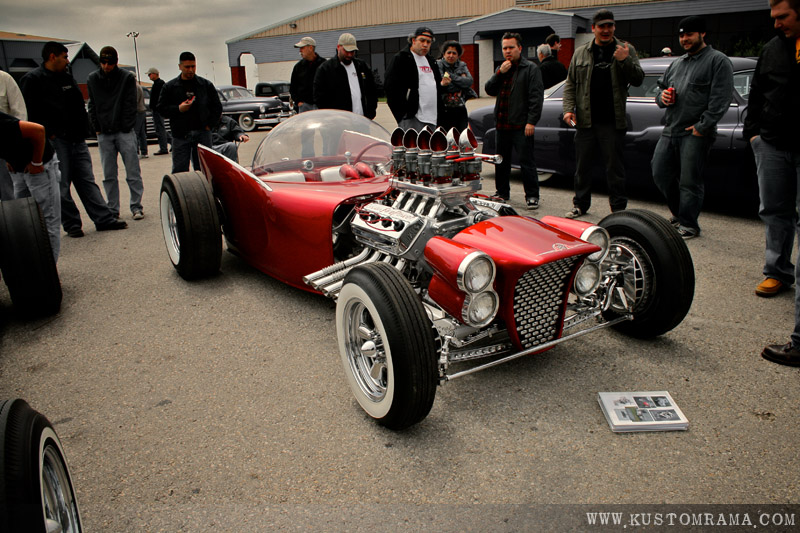 Atomic Punk standing out among a lot of black rides