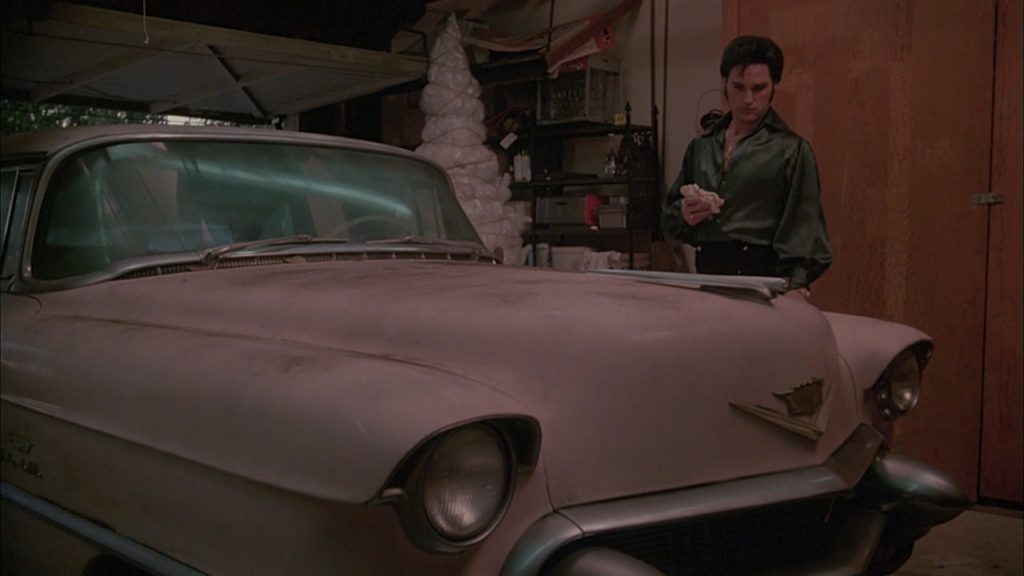 Elvis and the famous pink Cadillac