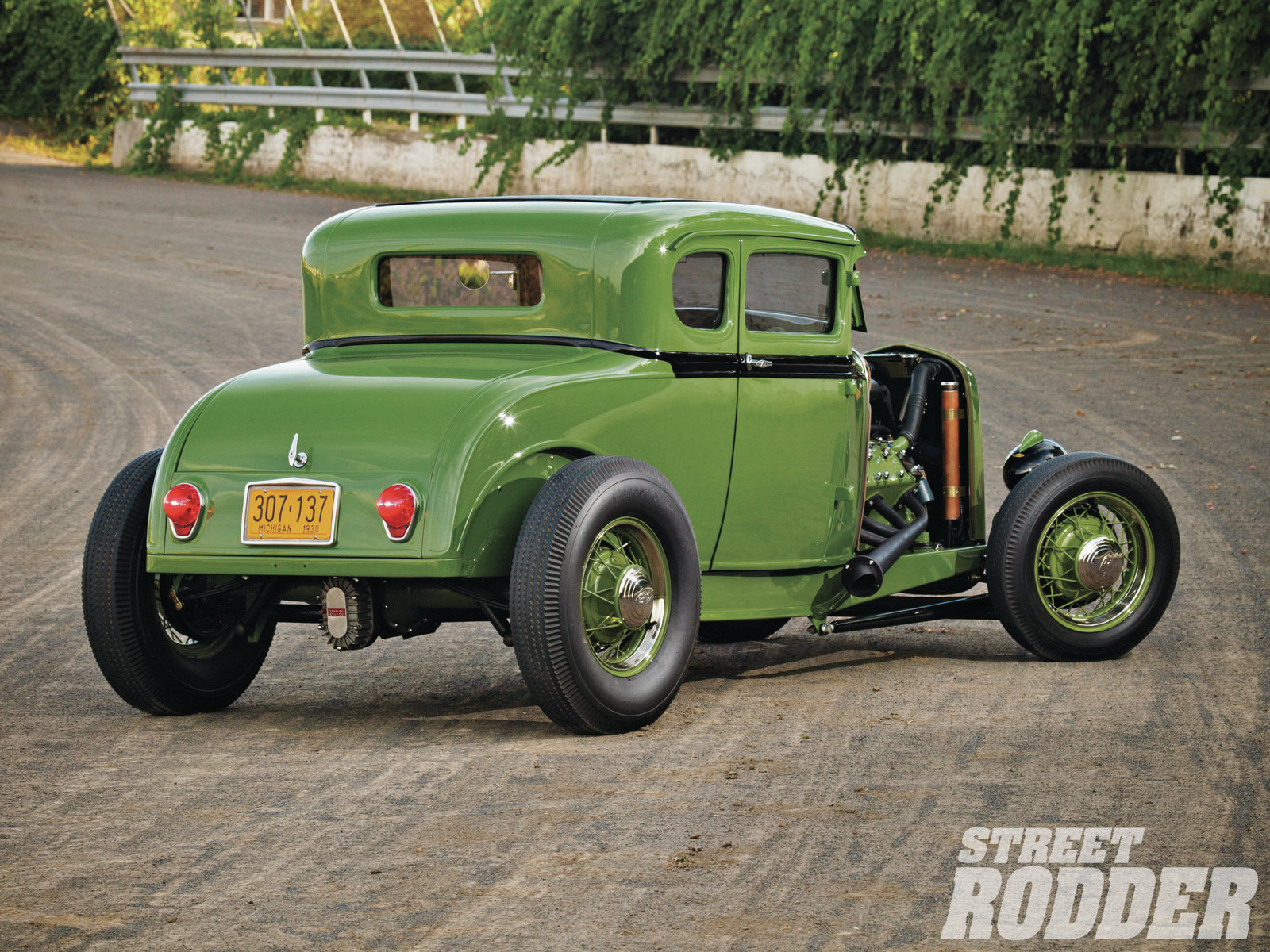 Rear photo of Gas Axe Garage Lincoln-Zephyr V12-powered Ford