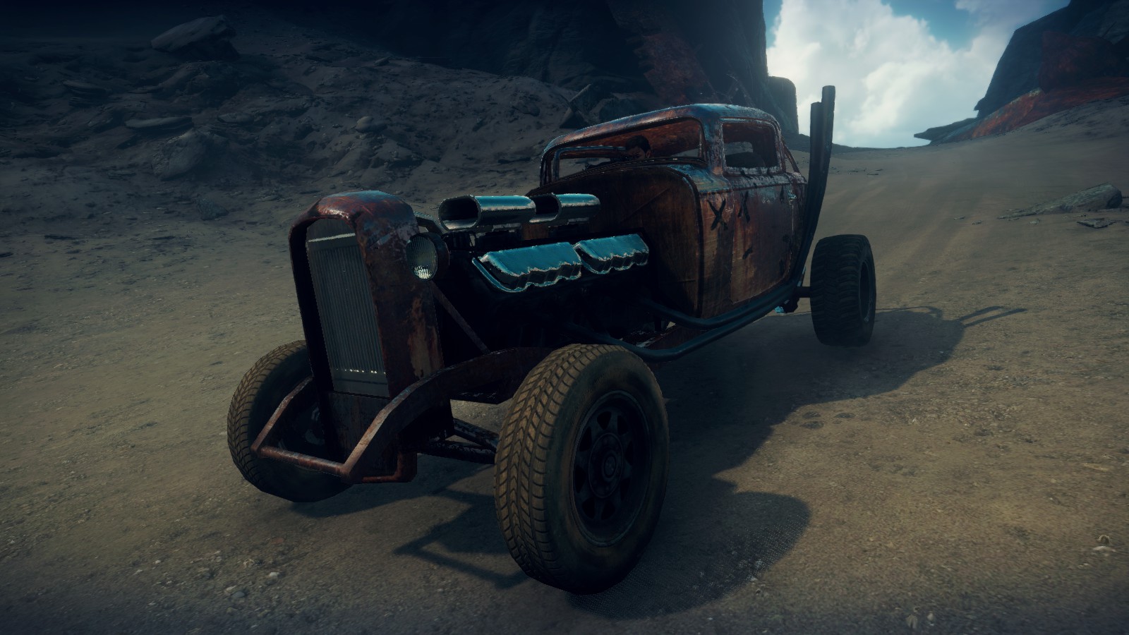 Elvis the GMC V12 hot-rod in Mad Max videogame, rusty version, front quarter