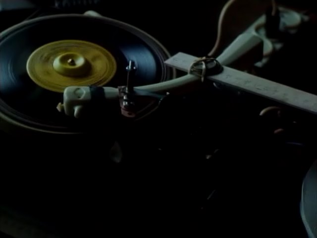 music on the ribs, a shot from the movie, Red Heat, Red Hot, 1993
