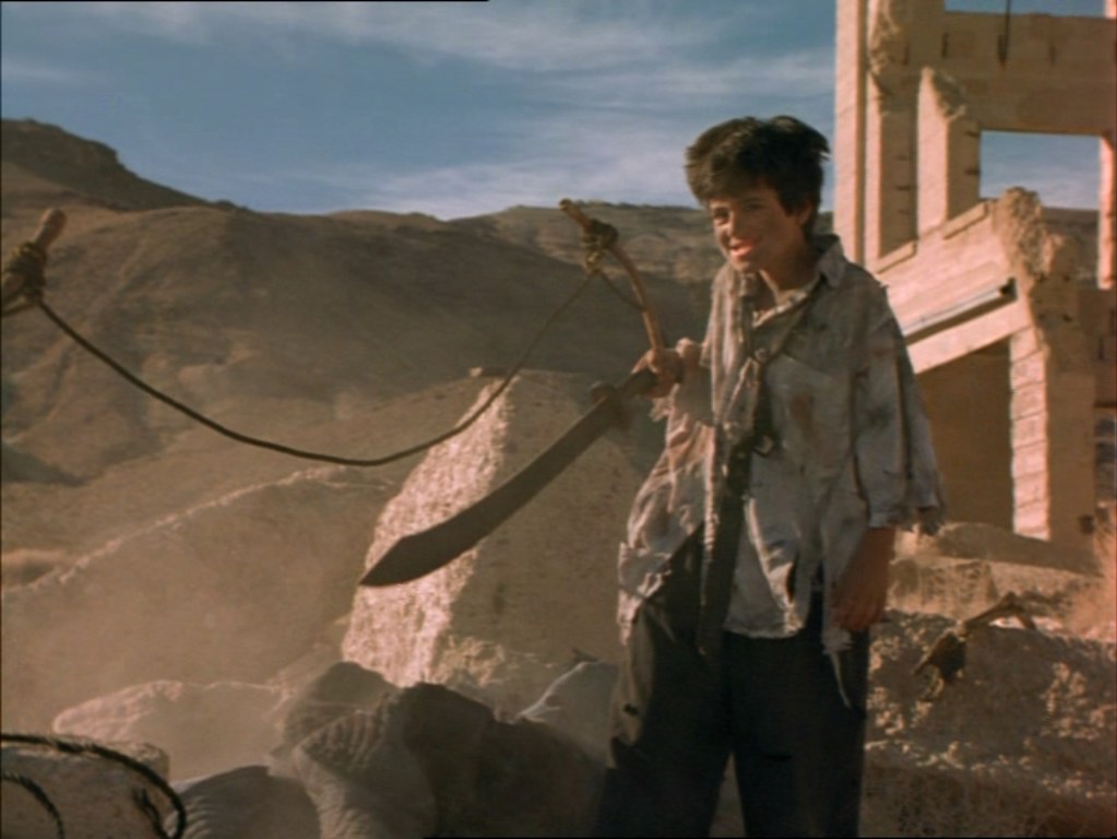 Six-Stringed Samurai, Justin McGuire, The Kid