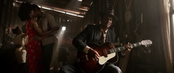 black den with blues, a shot from the movie Elvis 2022