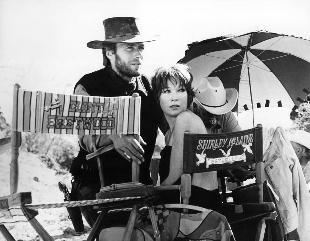 Clint Eastwood and Shirley MacLaine on the set of a Western