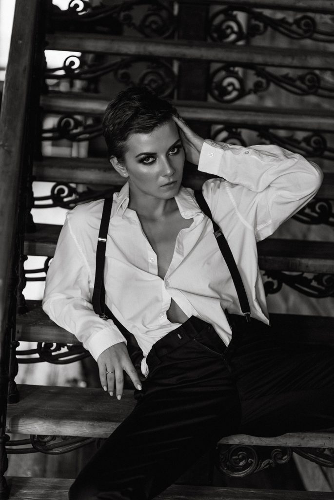 Inga Lis, topless photo in trousers with suspenders