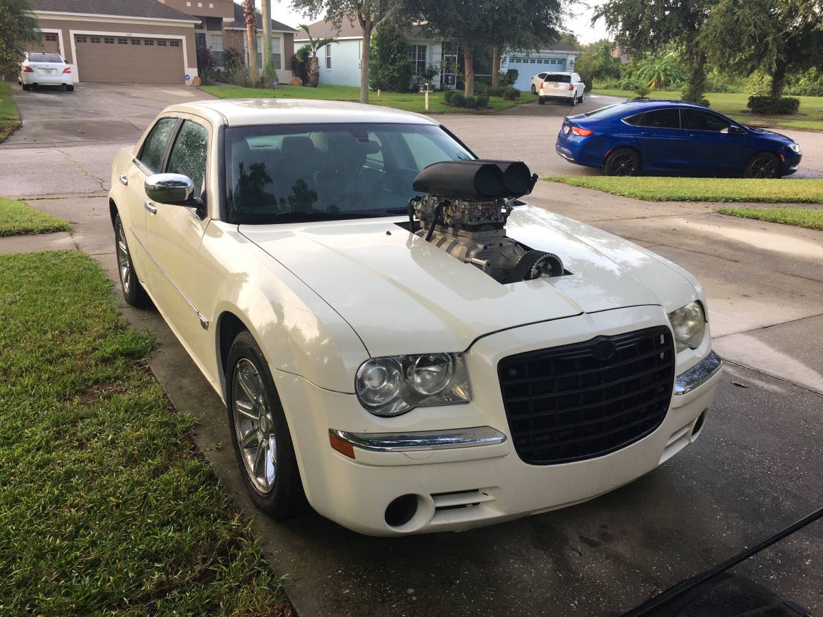 White Chrysler 300C with classic supercharging, photo 3.