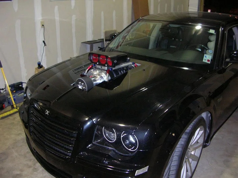 Black Chrysler 300C with classic supercharging.