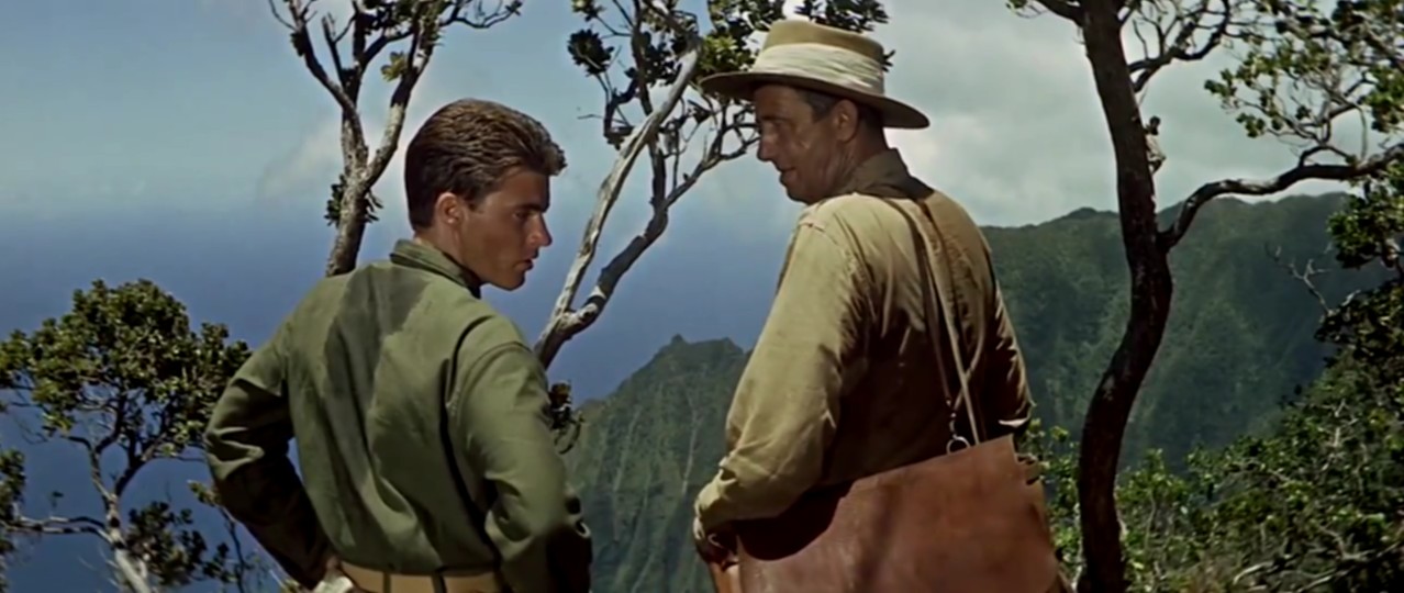 Ricky Nelson (Tommy Hanson) Chips Rafferty (Patterson) in the movie The Wackiest Ship in the Army