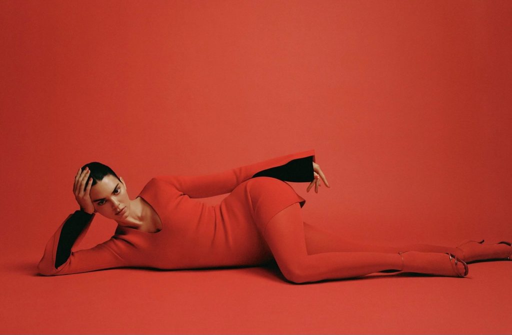 Kendall Jenner on a red background in red