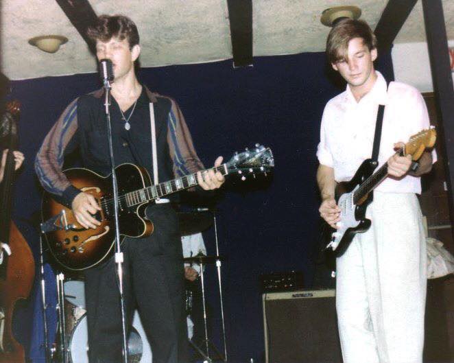 Chris Isaak and James Wilsey on stage