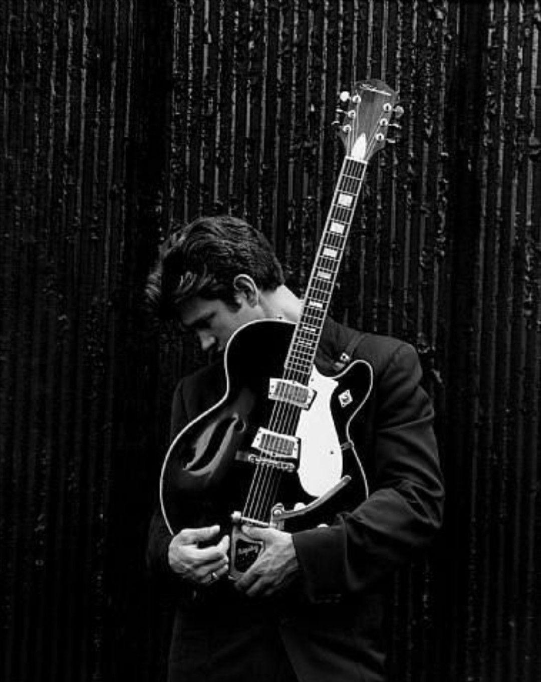 Chris Isaak with the Silvertone 1446L guitar that gave the album its name