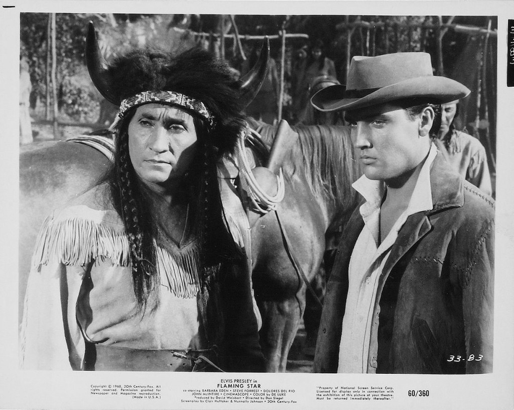 Paysar (Elvis Presley) and the chief of the Kiowa tribe named Bull Horn