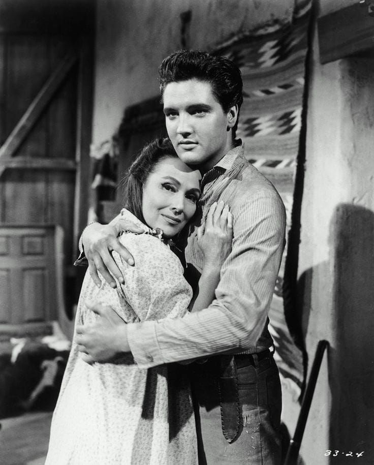 Neddy (Dolores del Rio) and her son Peysar (Elvis Presley)