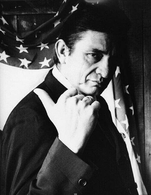 Johnny Cash on the background of the American flag