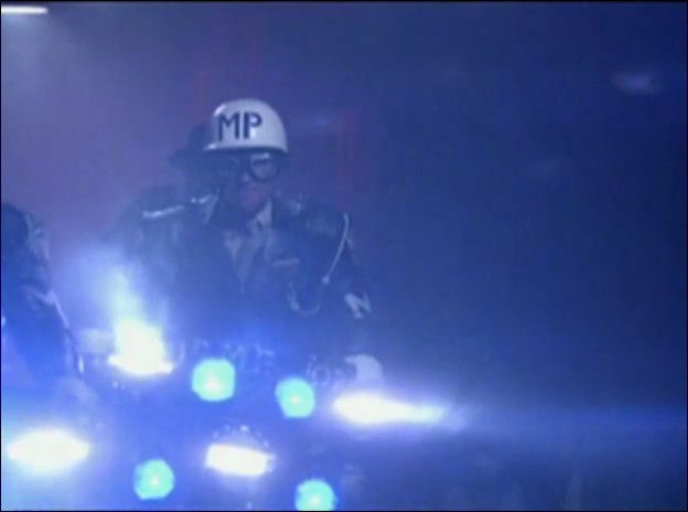 a shot from the movie Rebel (1985)