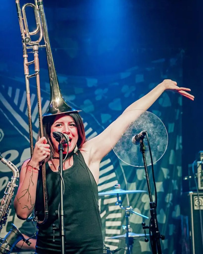 trumpeter of the band Queens of Everything