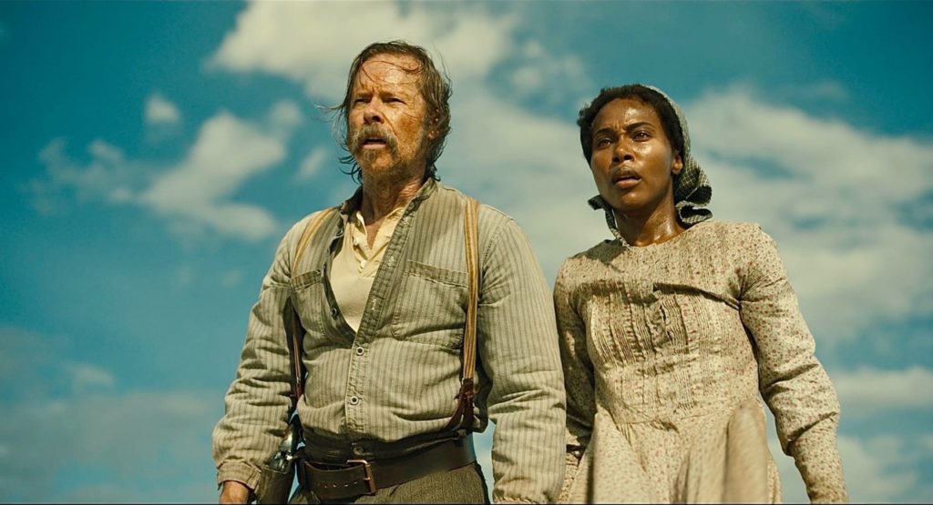 Guy Pearce and DeVanda Weiss in the film Killing Faith 2025