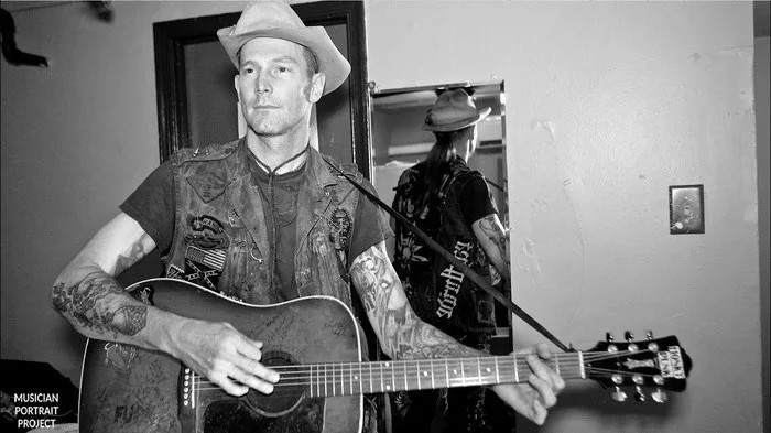 Hank Williams III with guitar
