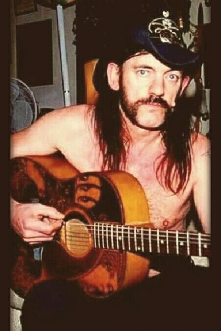 Lemmy the Bard with acoustic guitar