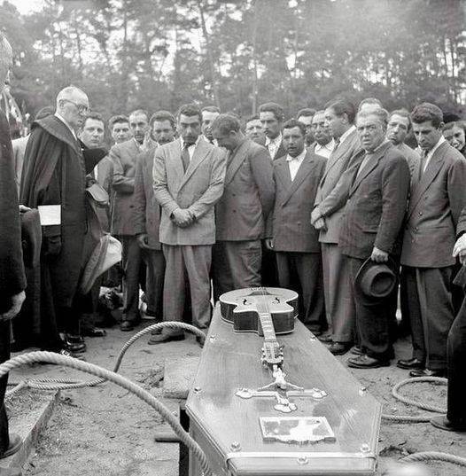Django Reinhardt's funeral, with his brother Joseph standing by the coffin