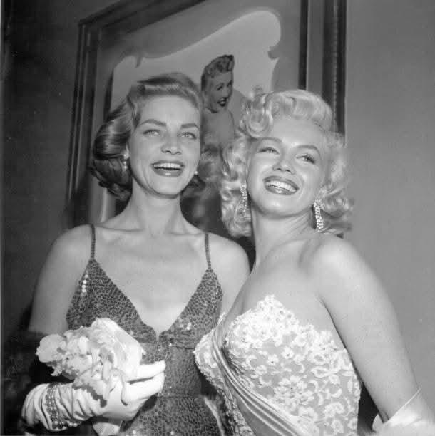 Lauren Bacall and Marilyn Monroe at the premiere of Marry a Millionaire
