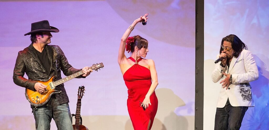 Robert Rodriguez, Patricia Vonne and Alex Ruiz, performing at the 2014 Texas Film Awards